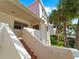 Exterior stairs leading to condo entrance at 760 Village Cir # 212, Venice, FL 34292