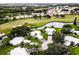 Aerial view of community near golf course at 214 Wexford Pl # 150, Venice, FL 34293