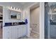 Bathroom with vanity, toilet, and walk-in shower at 856 Morgan Towne Pl, Venice, FL 34292