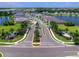 Aerial view of community entrance and lake at 18260 Vizcaya Ct, Venice, FL 34293
