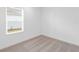 Simple bedroom with neutral carpeting and window at 18260 Vizcaya Ct, Venice, FL 34293