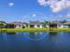 Aerial view of home and lake at 18260 Vizcaya Ct, Venice, FL 34293