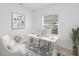 Bright home office features a desk, chair, and window at 18260 Vizcaya Ct, Venice, FL 34293