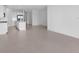 Modern kitchen with white cabinets, stainless steel appliances, and an island at 18260 Vizcaya Ct, Venice, FL 34293
