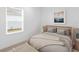 Bedroom with neutral decor and window at 18260 Vizcaya Ct, Venice, FL 34293