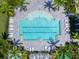 Community pool with lounge chairs at 18260 Vizcaya Ct, Venice, FL 34293