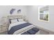 Charming bedroom with window and neutral decor at 18260 Vizcaya Ct, Venice, FL 34293