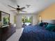 Main bedroom with a king bed and access to the pool at 424 Baycrest Dr, Venice, FL 34285