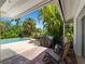 Relaxing patio with pool view, lounge chairs, grill at 424 Baycrest Dr, Venice, FL 34285
