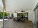 Covered patio overlooking refreshing pool, outdoor furniture at 424 Baycrest Dr, Venice, FL 34285