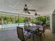 Covered patio with pool view, dining table and chairs at 424 Baycrest Dr, Venice, FL 34285