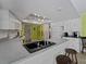 Modern kitchen island with breakfast bar and stainless steel appliances at 424 Baycrest Dr, Venice, FL 34285
