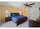Spacious main bedroom with a king-size bed and ensuite bathroom at 424 Baycrest Dr, Venice, FL 34285
