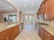 Spacious kitchen with granite countertops and stainless steel appliances at 145 Montelluna Dr, North Venice, FL 34275