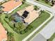 Aerial view of a single Gathering home with solar panels and pool at 145 Montelluna Dr, North Venice, FL 34275