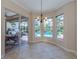 Bright breakfast nook overlooking the pool and patio at 145 Montelluna Dr, North Venice, FL 34275