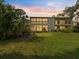 Two-story condo with a spacious backyard and lush landscaping at 886 Bird Bay Way # 206, Venice, FL 34285