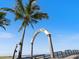 Entrance to the Venice Fishing Pier on a sunny day at 886 Bird Bay Way # 206, Venice, FL 34285