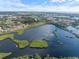 Aerial view showcasing the property's waterfront location and community at 886 Bird Bay Way # 206, Venice, FL 34285