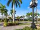 Quaint downtown area with clock tower and lush landscaping at 886 Bird Bay Way # 206, Venice, FL 34285