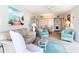 Spacious living area featuring a neutral color palette and ample natural light at 618 Bird Bay S Dr # 202, Venice, FL 34285