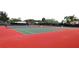 Two well-maintained tennis courts at 618 Bird Bay S Dr # 202, Venice, FL 34285
