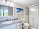 Clean bathroom with a large shower and updated vanity at 618 Bird Bay S Dr # 202, Venice, FL 34285