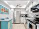 Galley kitchen with stainless steel appliances at 618 Bird Bay S Dr # 202, Venice, FL 34285