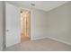 Spacious bedroom with neutral walls and carpeting at 240 Teramo Way, Nokomis, FL 34275
