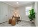 Home office with a desk, chair, and ample natural light at 240 Teramo Way, Nokomis, FL 34275