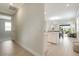 Open entryway with views of the kitchen and living room at 240 Teramo Way, Nokomis, FL 34275