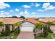 Single-Gathering home with attached garage and tile roof at 240 Teramo Way, Nokomis, FL 34275