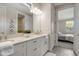 Elegant bathroom with double vanity and large shower at 240 Teramo Way, Nokomis, FL 34275