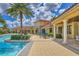 Resort-style pool with spacious deck and lounge area at 20318 Minuet Pl, Venice, FL 34293