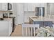 Modern kitchen with stainless steel appliances and an island at 20318 Minuet Pl, Venice, FL 34293