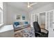 Bright and airy home office with comfortable seating at 20318 Minuet Pl, Venice, FL 34293