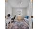 Home office with built-in desk and French doors at 20318 Minuet Pl, Venice, FL 34293