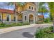Community clubhouse with stone and stucco exterior at 20318 Minuet Pl, Venice, FL 34293