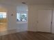 Bedroom with tiled floors and view of bathroom at 268 Shamrock Blvd, Venice, FL 34293