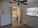 Bedroom with ceiling fan, tiled floors and closet at 268 Shamrock Blvd, Venice, FL 34293