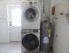 Convenient laundry room with washer, dryer, and water heater at 268 Shamrock Blvd, Venice, FL 34293