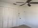 Bedroom with large closet and ceiling fan at 268 Shamrock Blvd, Venice, FL 34293