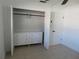 White closet with built in drawers and hanging rod at 268 Shamrock Blvd, Venice, FL 34293