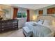 Spacious bedroom with king-size bed and plenty of dresser space at 612 Guild Dr # 18, Venice, FL 34285