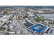 Aerial view of a motel near the ocean, showing surrounding businesses and infrastructure at 612 Guild Dr # 18, Venice, FL 34285