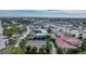 Aerial view showcasing a motel and surrounding buildings in a coastal city at 612 Guild Dr # 18, Venice, FL 34285