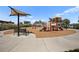 Modern playground with playset and shaded seating area at 12460 Ghiberti Cir # 202, Venice, FL 34293