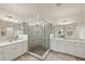 Double vanity bathroom with large walk-in shower at 12460 Ghiberti Cir # 202, Venice, FL 34293