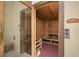 Community sauna with wooden interior and bench seating at 12460 Ghiberti Cir # 202, Venice, FL 34293