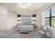 Main bedroom with a king-size bed and stylish furniture at 12460 Ghiberti Cir # 202, Venice, FL 34293